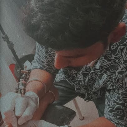 Red Alpha Tattoos